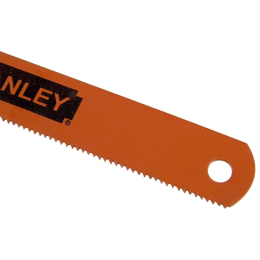 STANLEY 0-15-906 orange saw blade with fine teeth, close-up angle on white background.