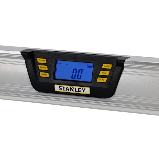 STANLEY 0-42-086 digital level with LCD screen and yellow buttons, close-up on white background.