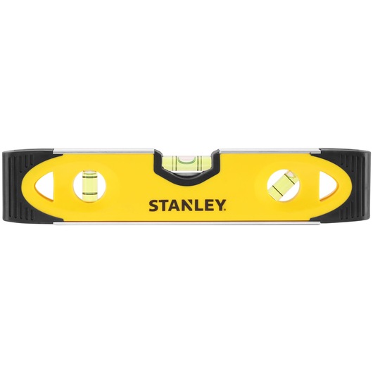 Stanley yellow spirit level with three bubble vials and black ends, used for measuring straight lines.