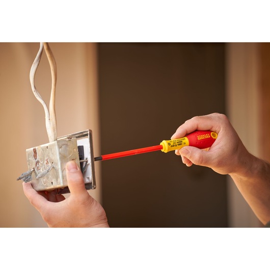 Photo of STANLEY 0-65-419 insulated screwdriver used on an electrical switch box.