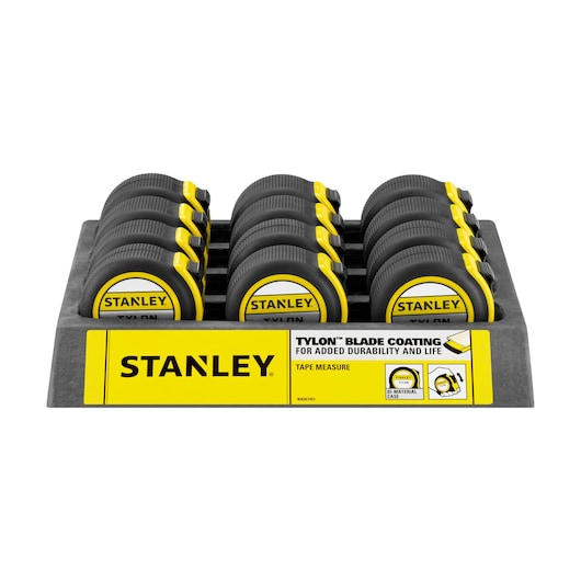 Photo of STANLEY 1-30-657 tape measures in yellow and black display tray, front angle.
