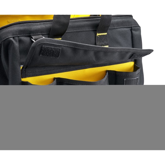 STANLEY 1-96-183 tool bag in black and yellow, front pocket with Velcro flap, close-up angle.