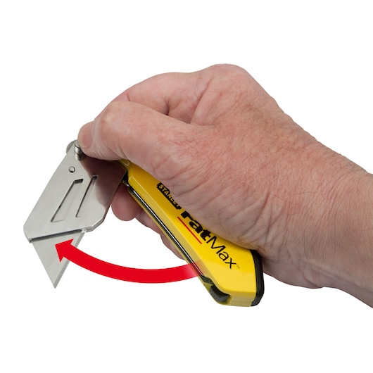 STANLEY FMHT0-10827 folding utility knife in hand, yellow handle, showing blade rotation.