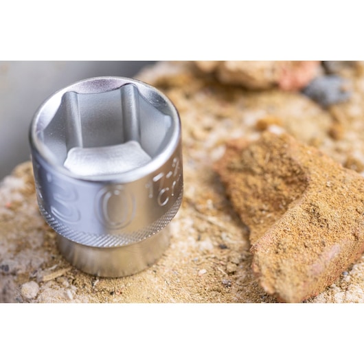STANLEY FMMT82681-0 silver socket tool on rocky surface, close-up photography.