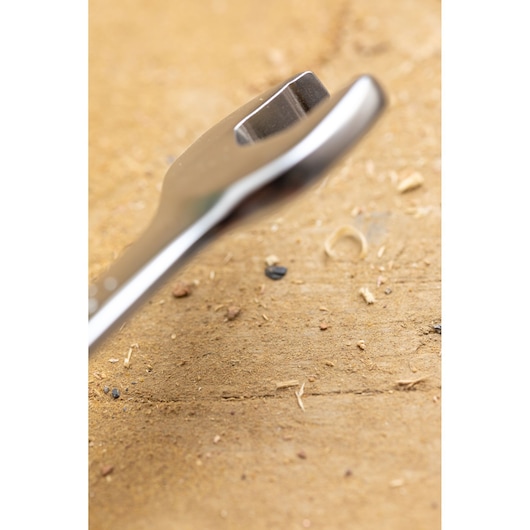 STANLEY FMMT82845-0 wrench close-up on wooden surface, focus on open end, photography category.