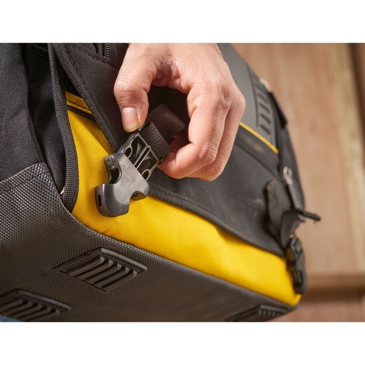 STANLEY FMST1-80149 tool bag close-up showing black buckle and yellow fabric detail.